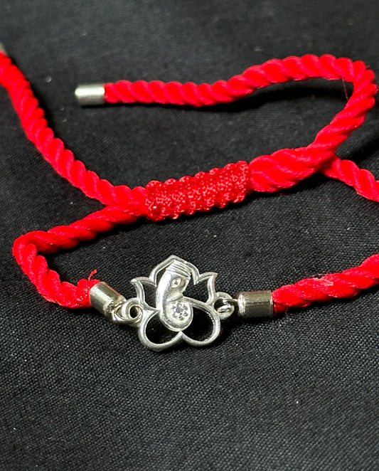 Divine Bloom Silver Ganesh Rakhi