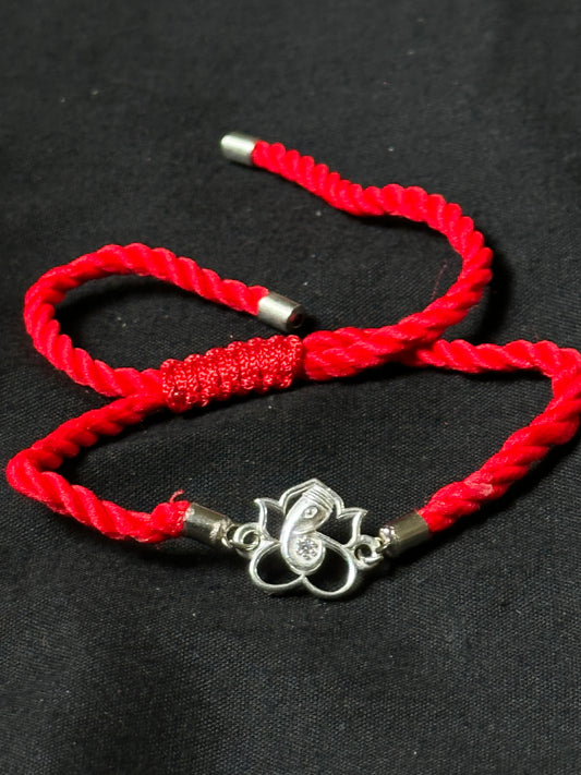 Divine Bloom Silver Ganesh Rakhi